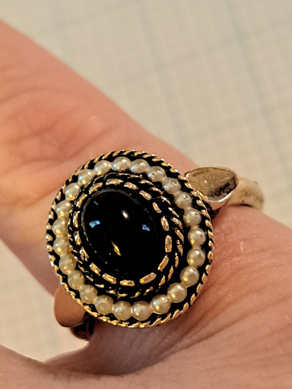 Avon Gold-Tone Black Stone Ring with Pearl Halo
